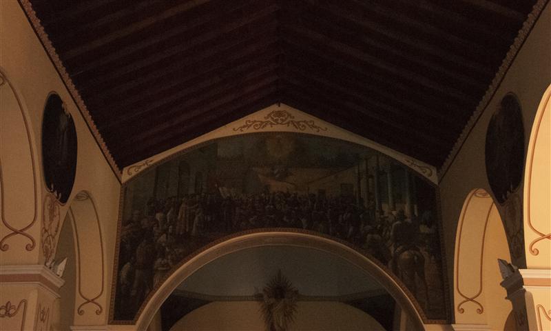 El gran mural del pintor dominicano Luis Dessangles, donde se refleja ese momento único de la bendición de nuestro emblema