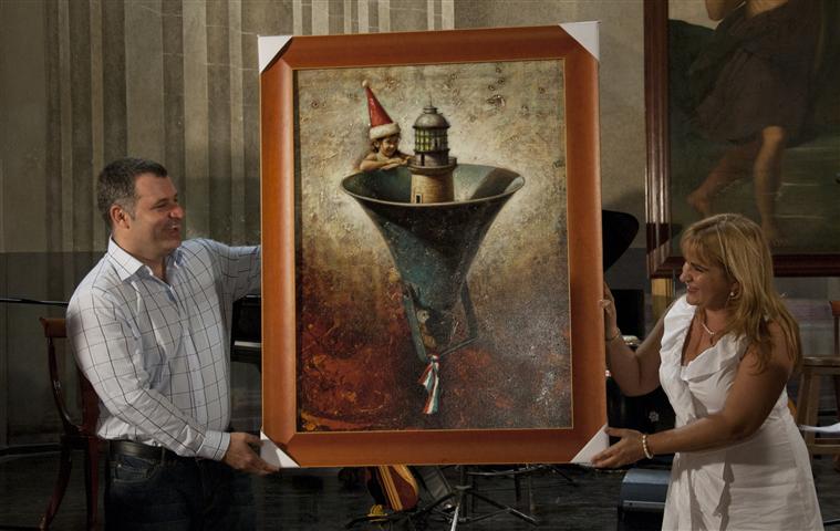Maykel Herrera obsequió un cuadro de su autoría a la emisora