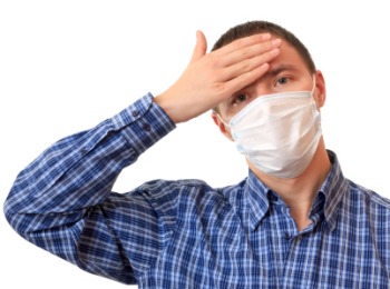 A man is in a non-permanent medical mask.