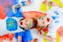 Two beautiful children enjoying their painting. Education.