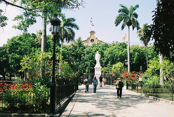 plaza-de-armas-havana-cuba-statue-cespedes-behind-capitanes-generales