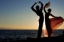 spanish dancers dancing by the sea in spain