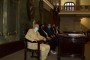 Miguel Barnet con la presidencia en el estrado del Aula Magna